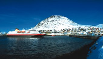 A Coastal Voyage ship visits a port on-route
